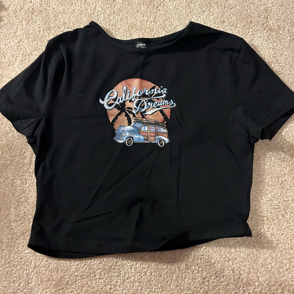 I am selling this white and black shirt bundle!